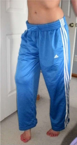 Girl wearing blue Adidas pants