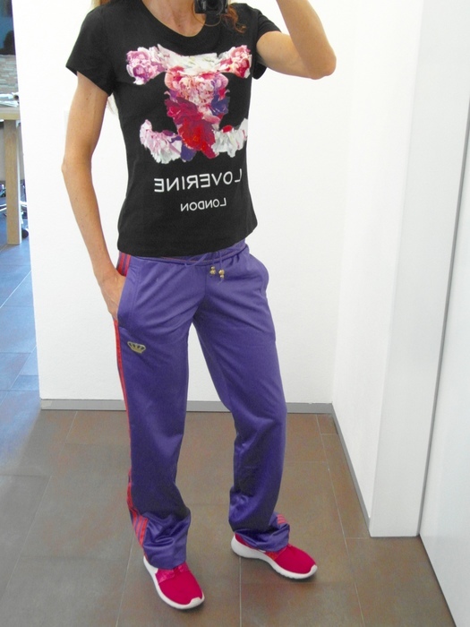 Girl with adidas RESPECT ME shiny purple pants