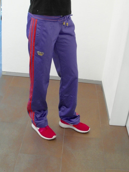 Girl with adidas RESPECT ME shiny purple pants