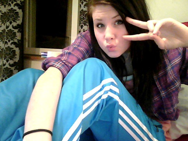 Girl with blue/white adidas pants