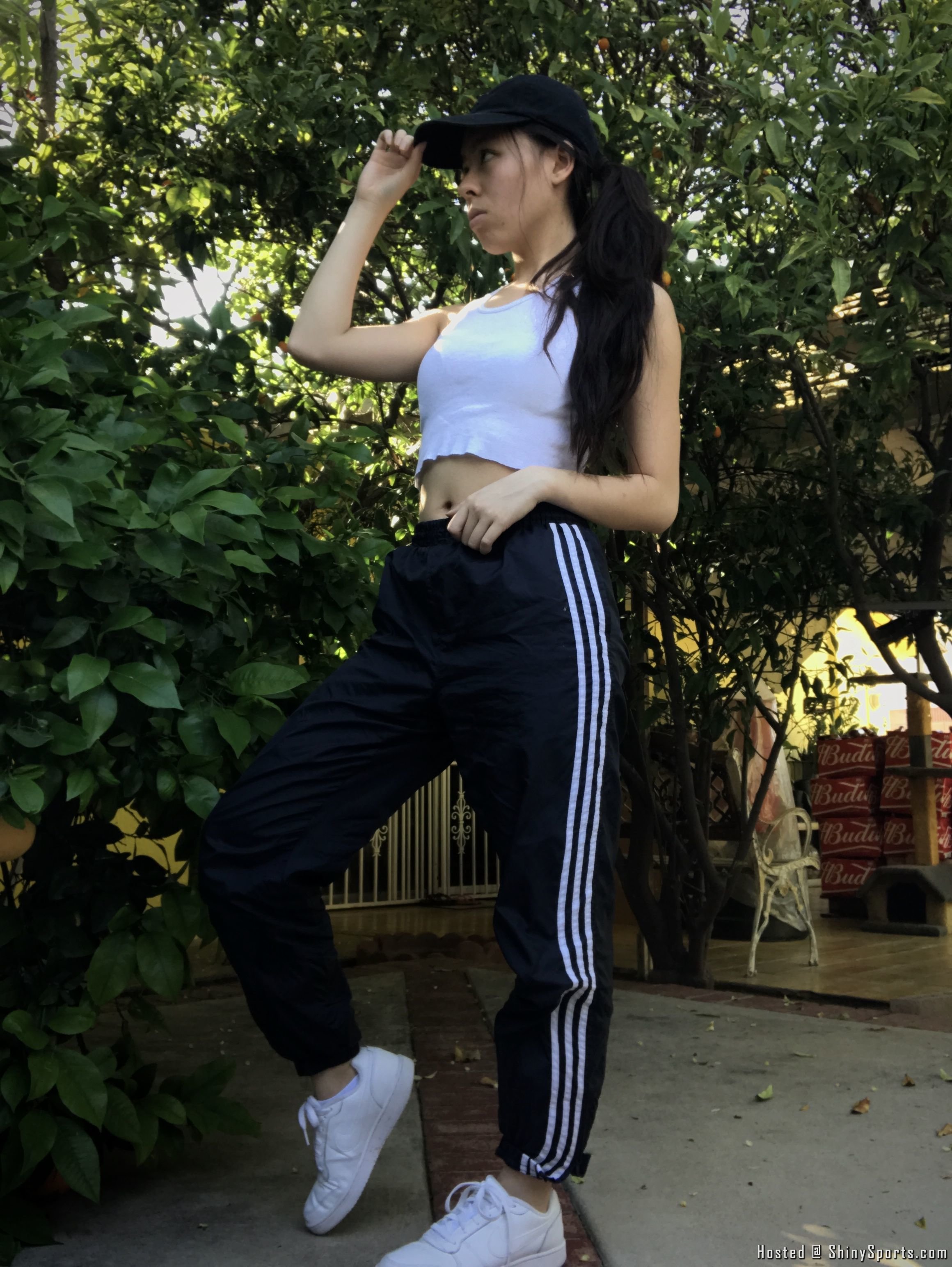 Hair_ ponytail through cap hole or low bun with hair in front.jpg