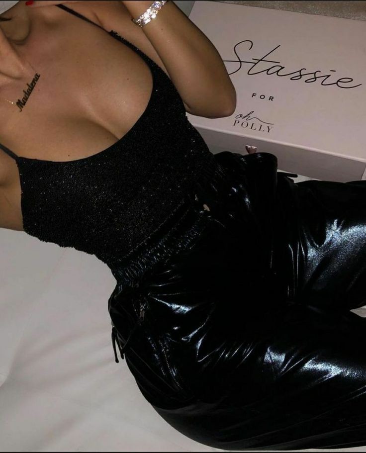 Hot girl in her shiny black pants