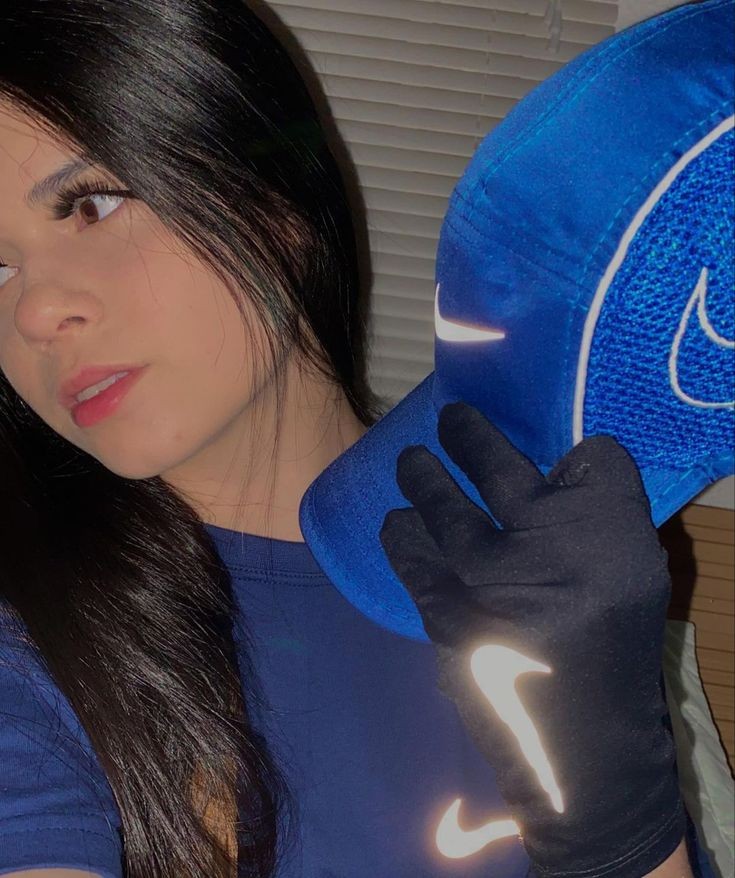 Hot girl in shiny nike gloves