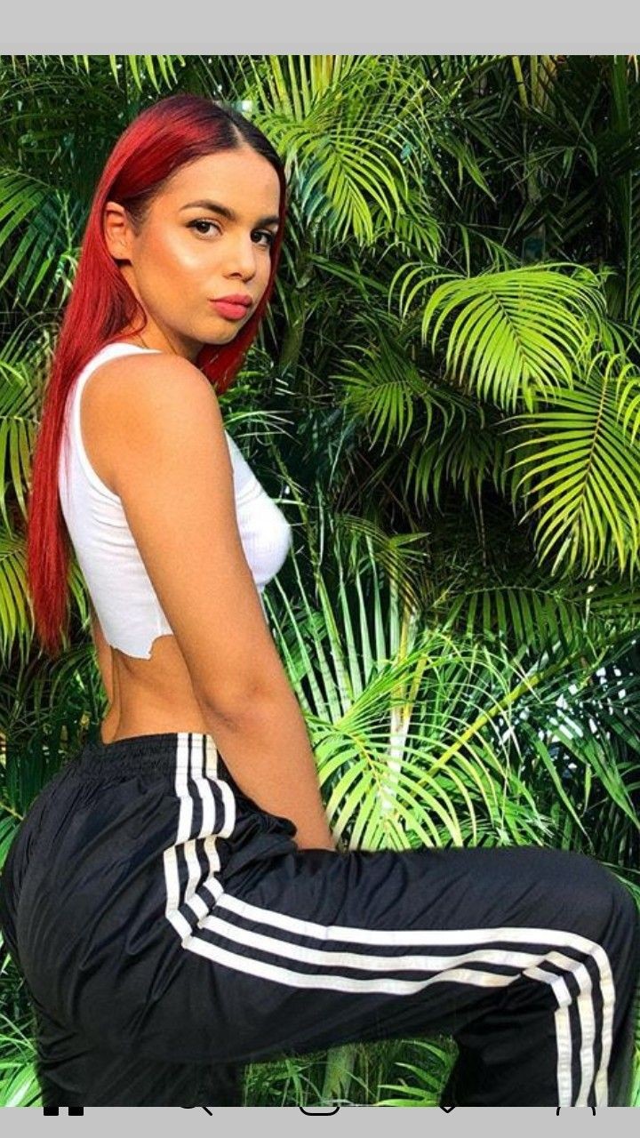 Hot girl teasing with her adidas pants