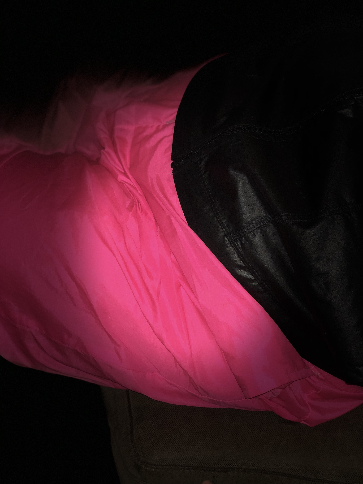 hot pink wind pants and shiny black windbreaker