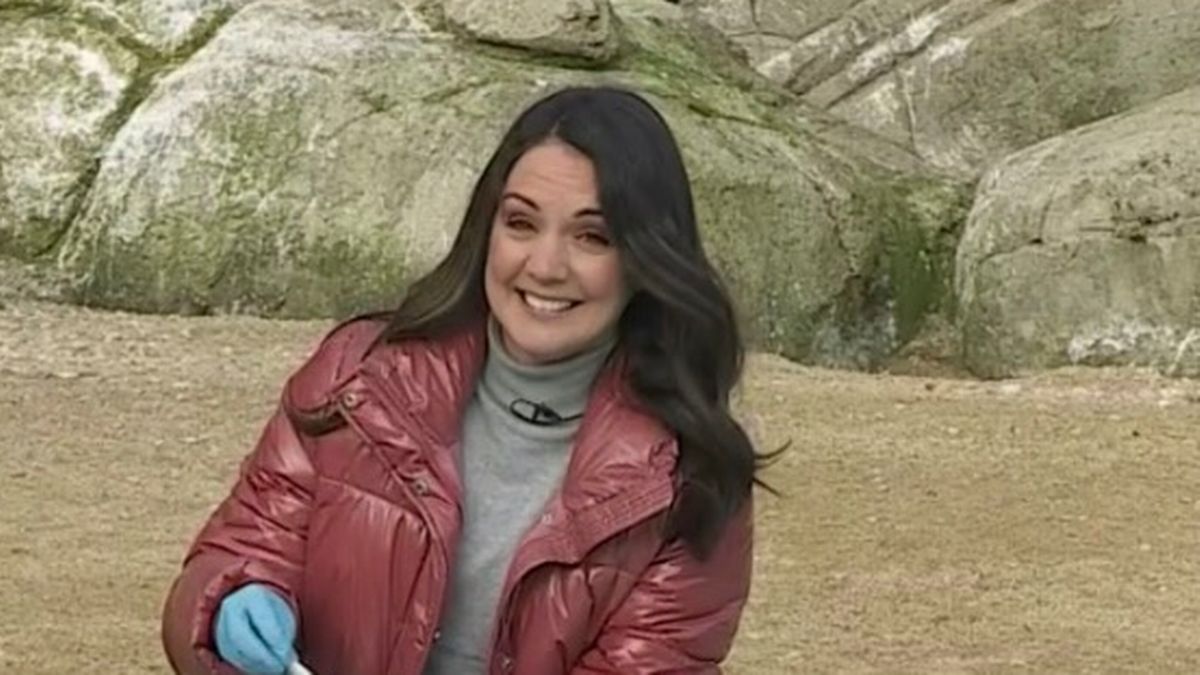 Laura Tobin red down jacket