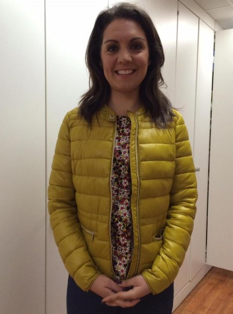 Laura Tobin yellow down jacket