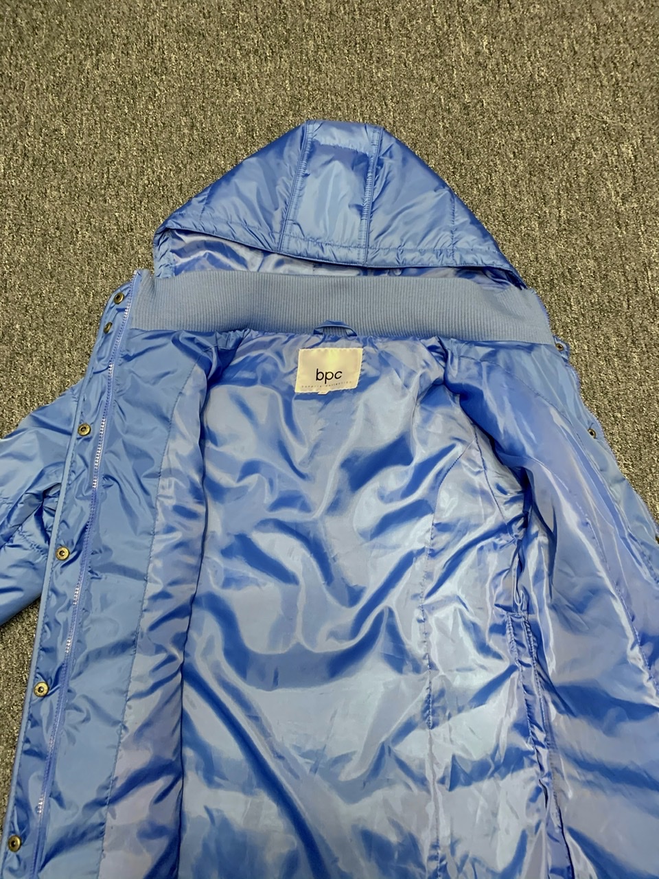 Light blue hooded nylon coat