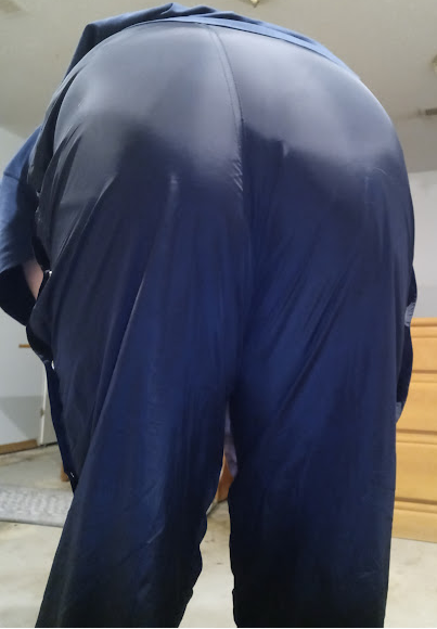 Me bending over in my American Eagle AE Outfitter Dark Blue Nylon Pants (with my big nylon bottom)