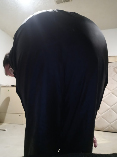 Me bending over in my Small Black Adidas Nylon Pants 1