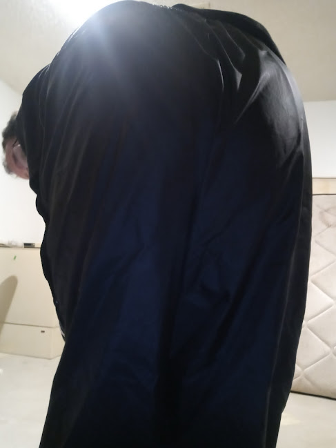 Me bending over in my Small Black Adidas Nylon Pants 2