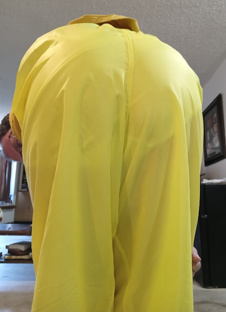 Me bending over in my yellow shirt & new yellow nylon pants (close up)