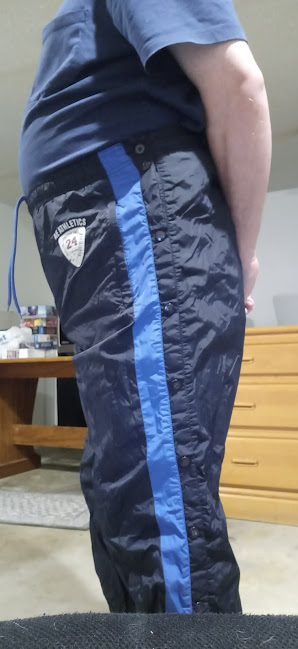 Me in American Eagle AE Outfitter Dark Blue Nylon Pants (with my hands behind my back) 3