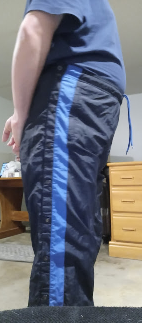 Me in American Eagle AE Outfitter Dark Blue Nylon Pants (with my hands behind my back) 4