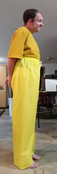 Me in my yellow shirt & my NEW yellow nylon pants w/my hands behind my back 2 (side 2)