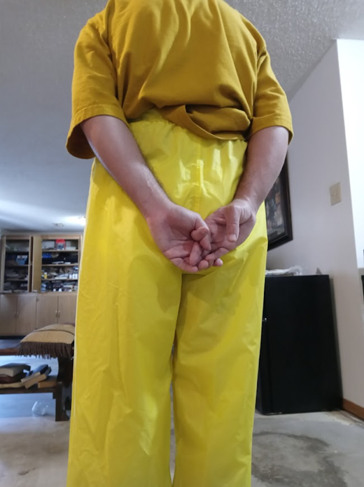 Me in my yellow shirt & my NEW yellow nylon pants w/my hands behind my back (back)