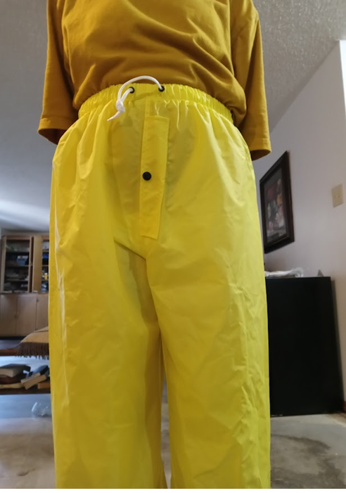Me in my yellow shirt & my NEW yellow nylon pants w/my hands behind my back (front).png