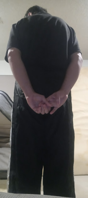 Me wearing my Large Black GTM Sportswear Polyester Pants (w/both hands behind my back) (back) 1