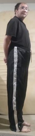 Me wearing my Large Black GTM Sportswear Polyester Pants (w/both hands behind my back) (side 2) 2