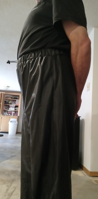 Me with my hands behind my back in my Black Shirt & Black Polyester Pants (side)