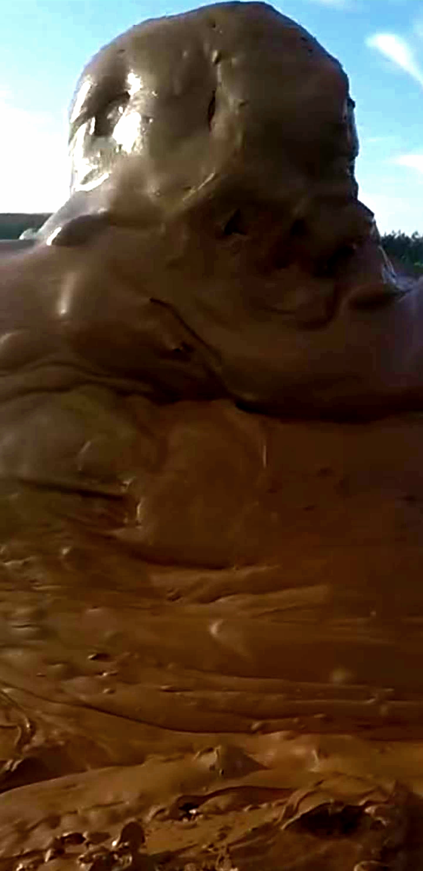 Muddy in an adidas nylon tracksuit