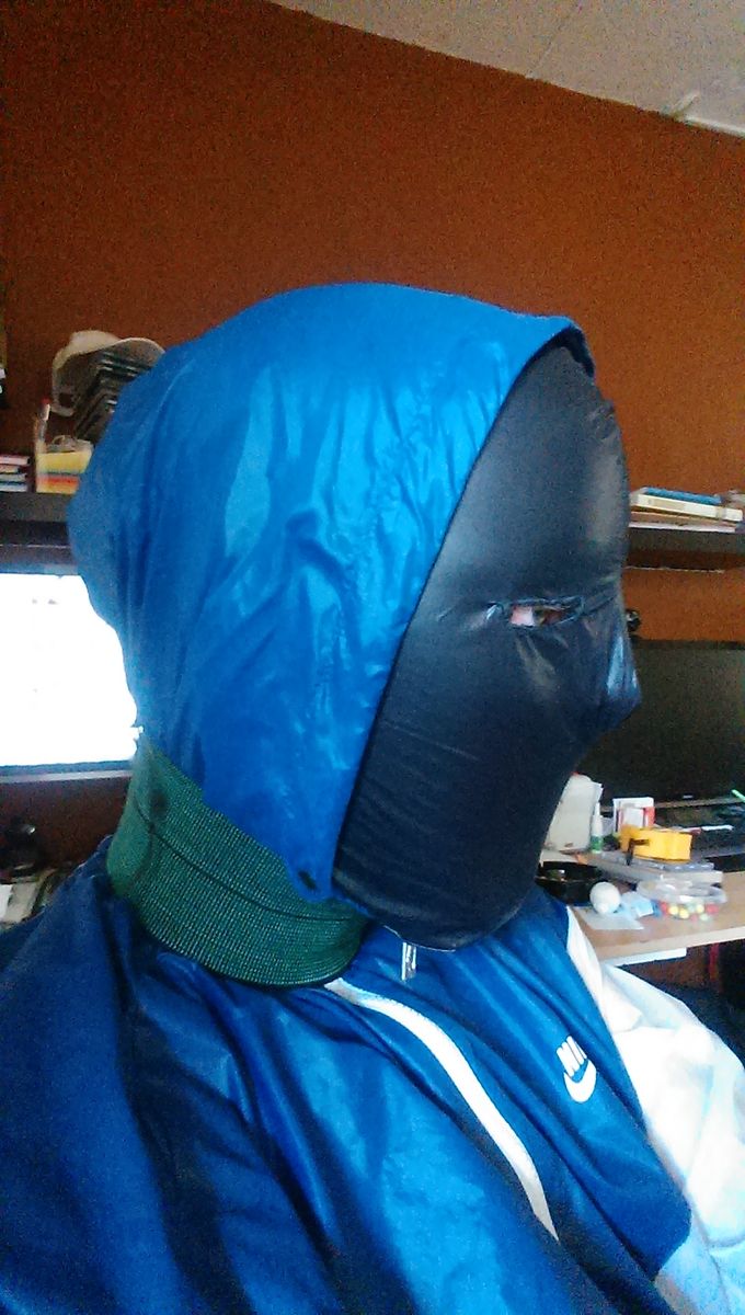 Nike windrunner summerized with homemade nylon hood(black) and elastic cuff around my neck.