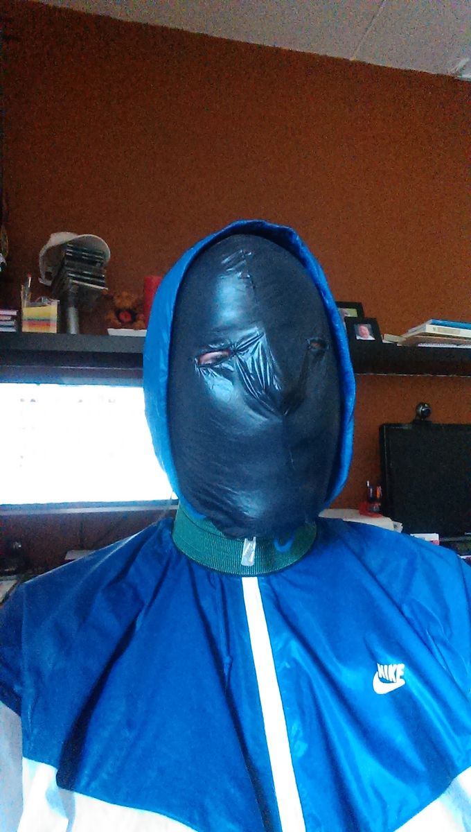 Nike windrunner summerized with homemade nylon hood(black) and elastic cuff around my neck.