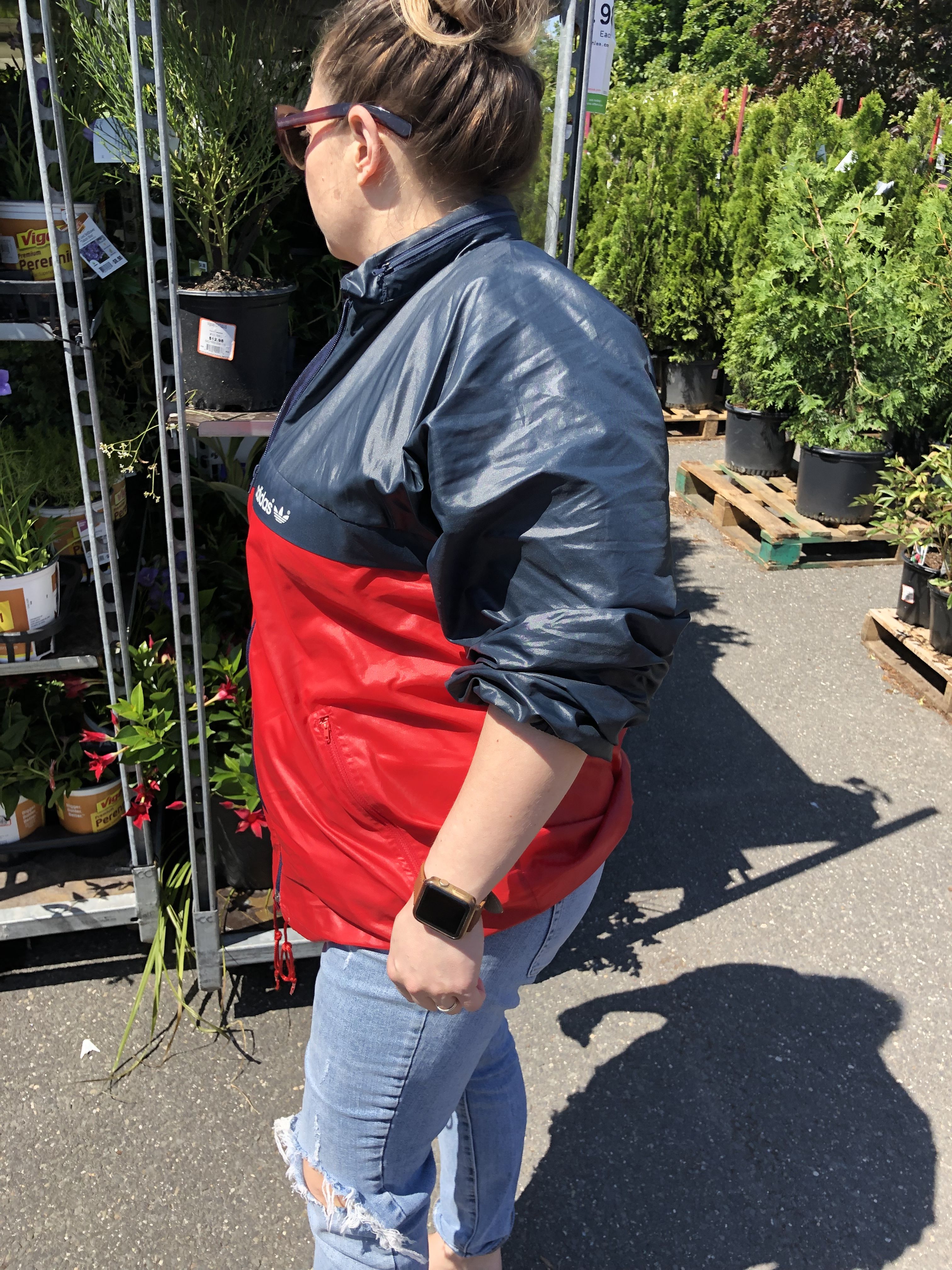 out in shiny vintage adidas windbreaker