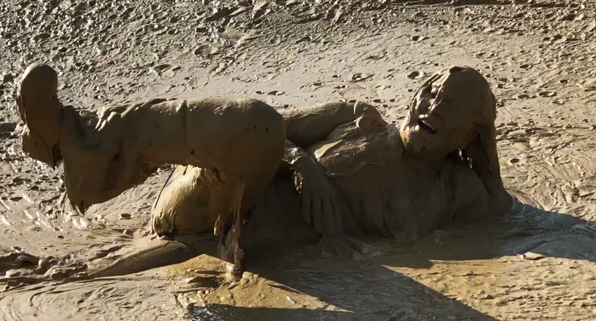 Plus size lady in Adidas jumpsuit