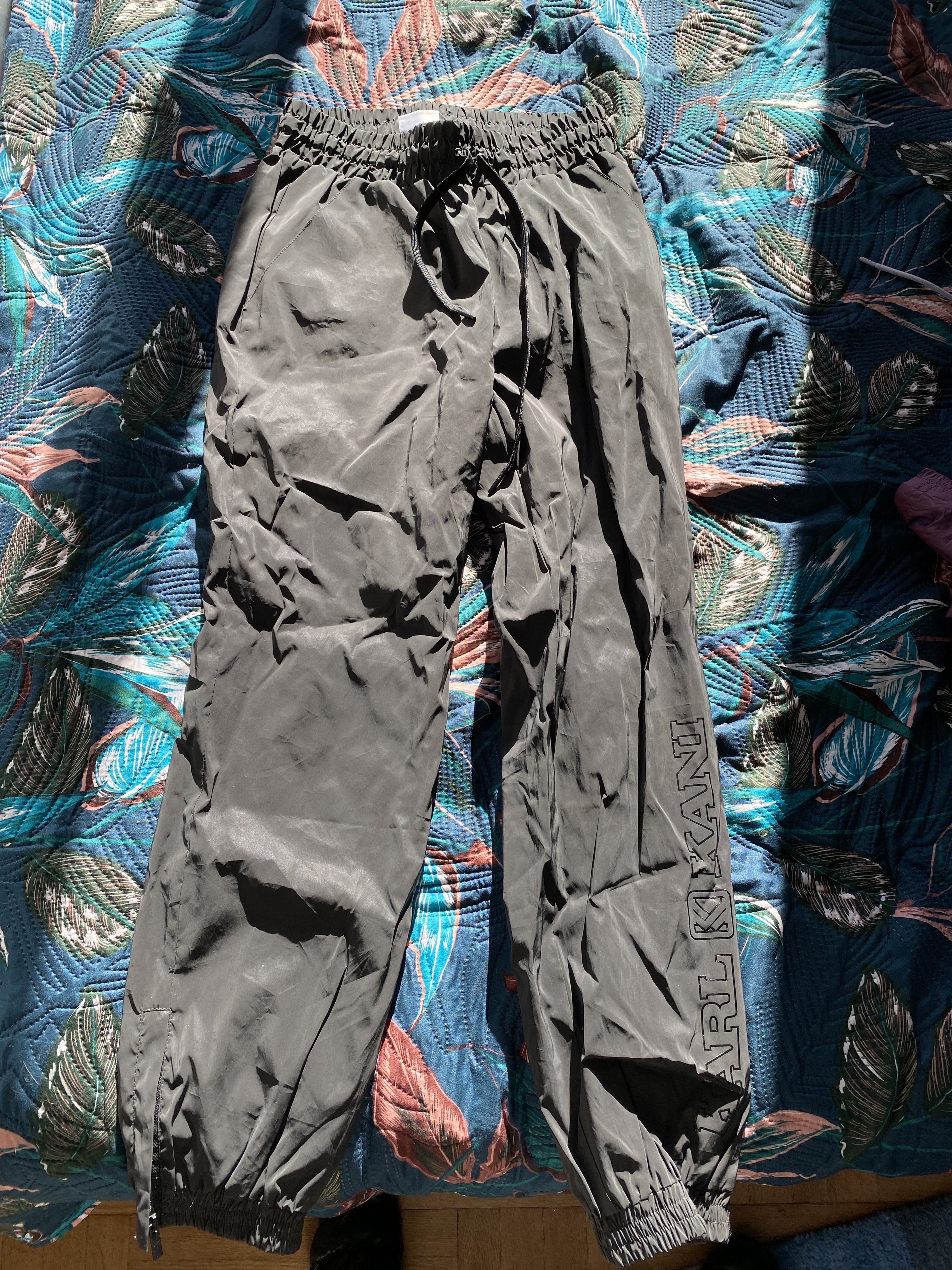 Reflective woven track pants from Karl Kani