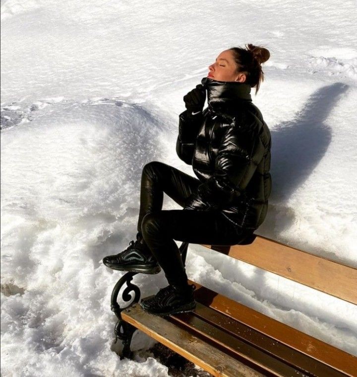 Sexy girl feeling good in her shiny outfit