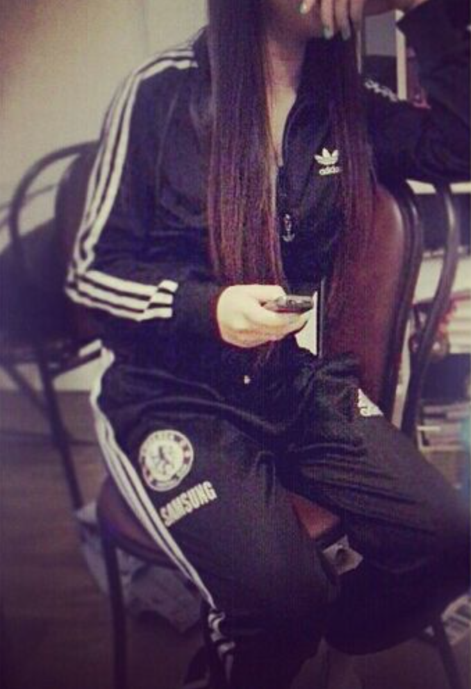 Shiny girl in tracksuit