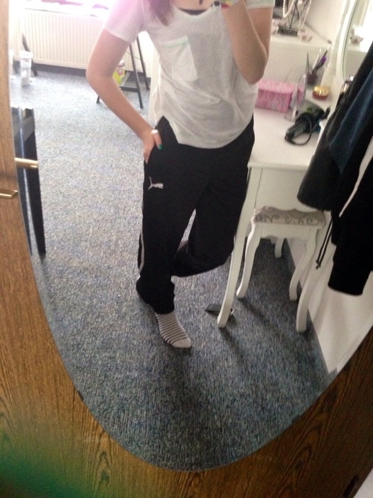 Sporty girl in Puma pants