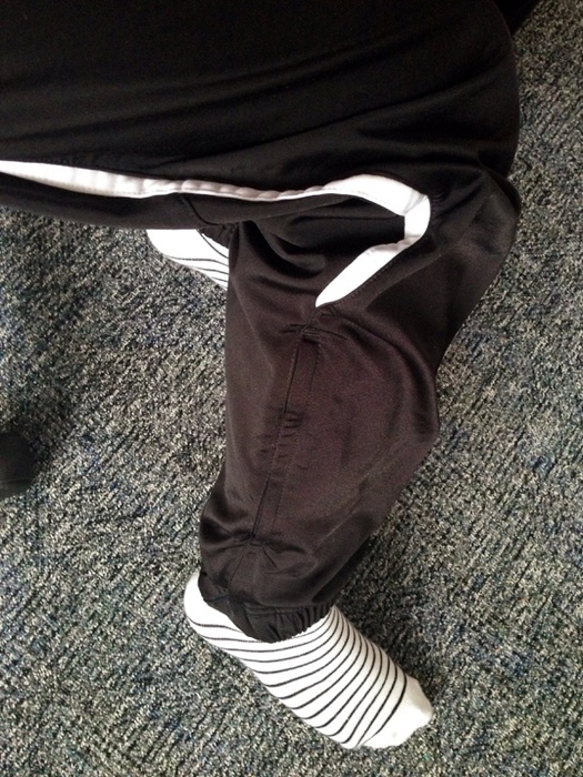 Sporty girl in Puma pants