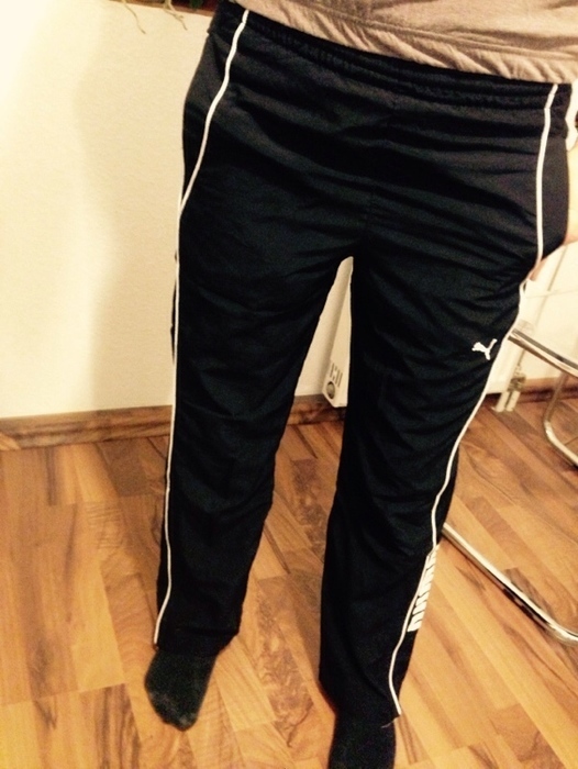 Sporty girl in Puma polyester pants