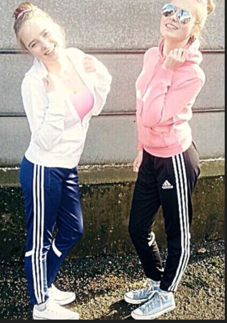 Two girls in shiny adidas trackies