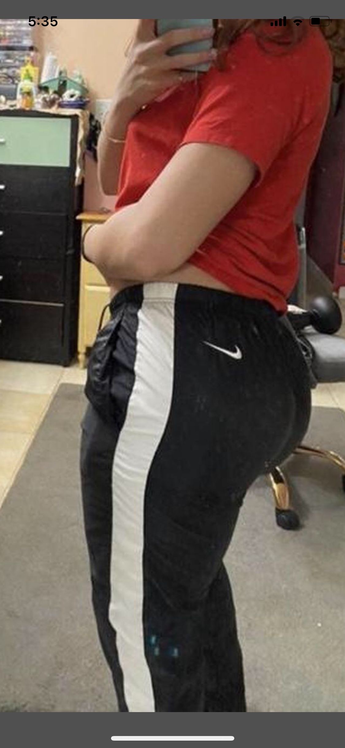 Woman in Nike Windpants